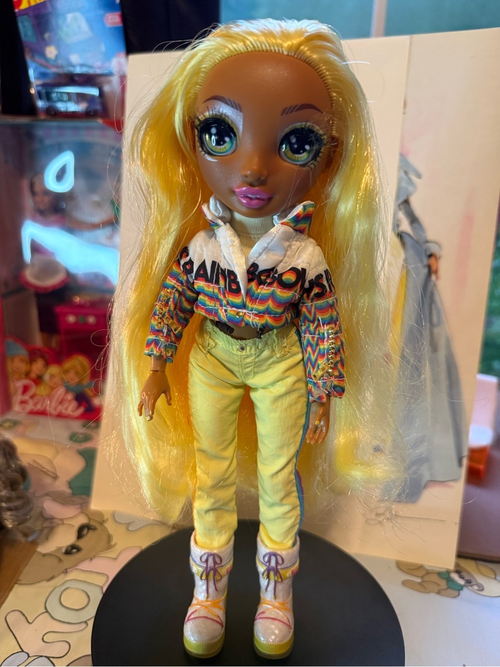 Bright Yellow-Haired Fashion Doll with Rainbow Jacket